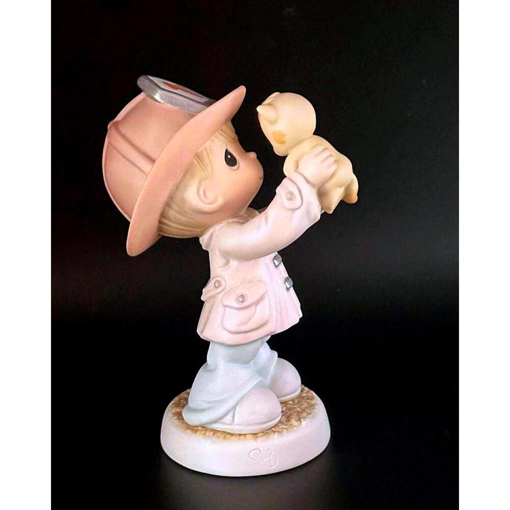 Precious Moments Figurine - Boy with Fireman Hat & Toy
